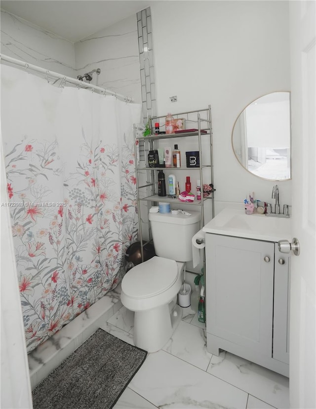 bathroom featuring a shower with curtain, marble finish floor, vanity, and toilet