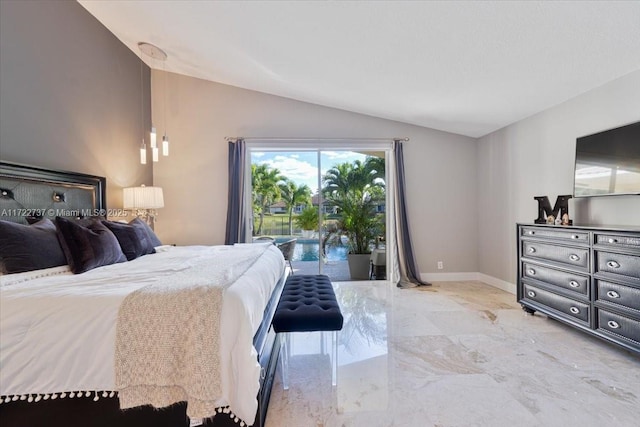 bedroom featuring lofted ceiling