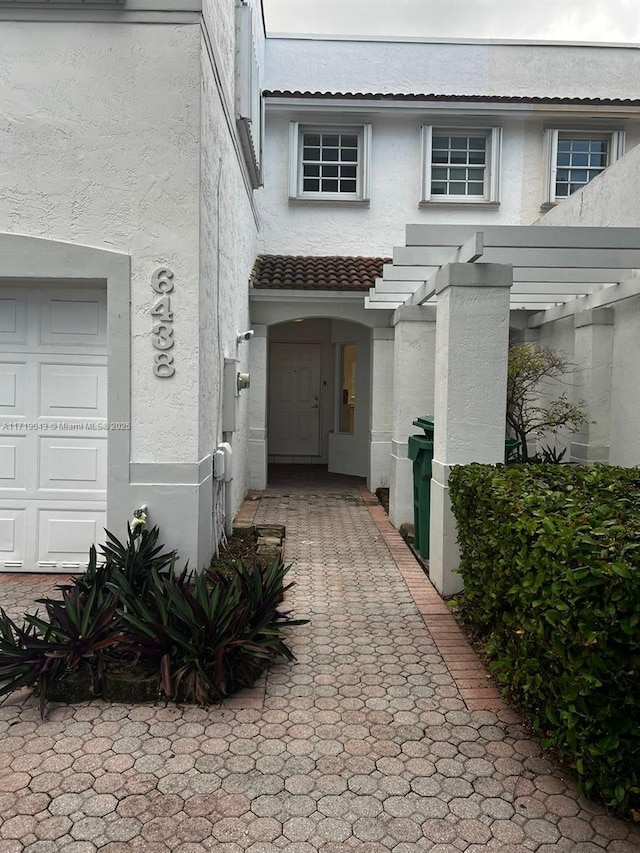 property entrance featuring a garage