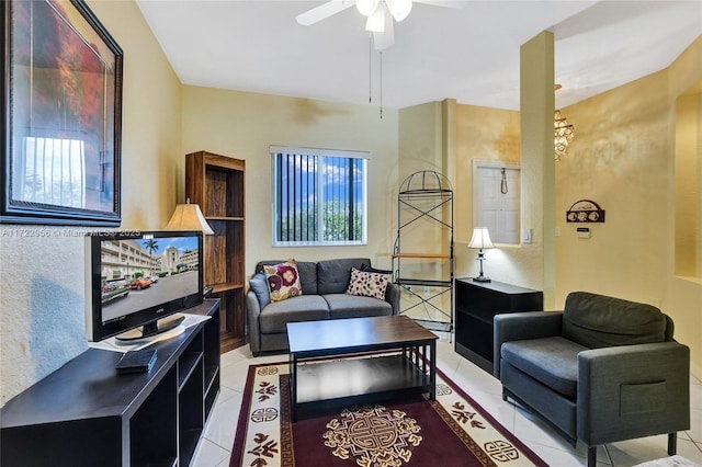 tiled living room featuring ceiling fan