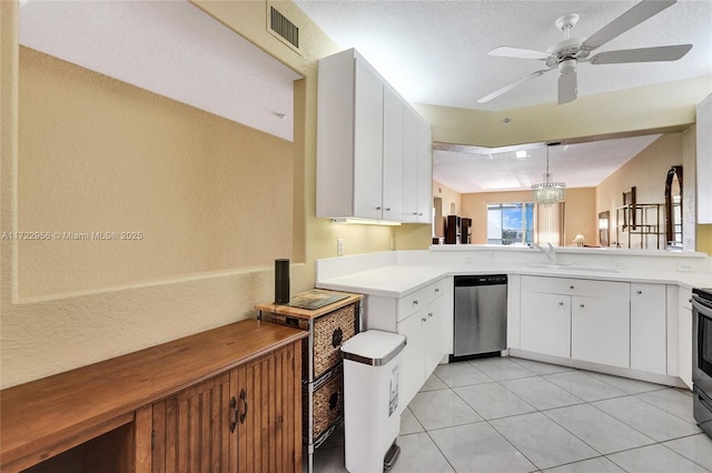 kitchen featuring dishwasher, pendant lighting, white cabinets, and kitchen peninsula