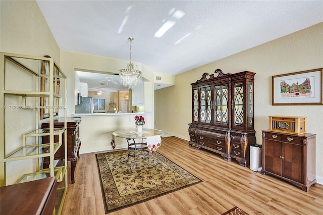 dining area featuring light wood-type flooring