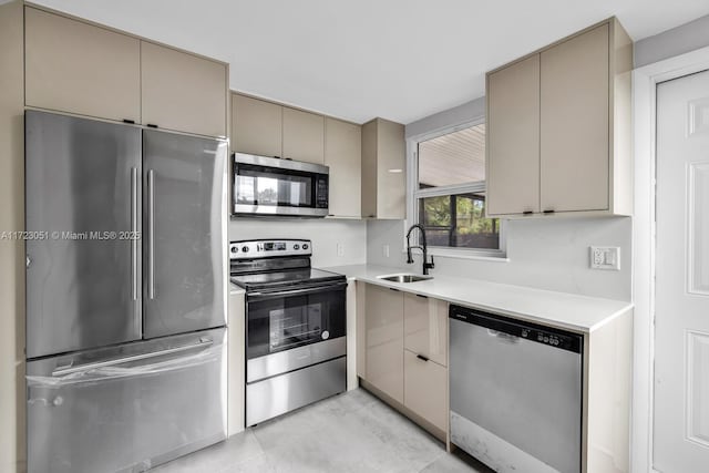 kitchen with appliances with stainless steel finishes and sink