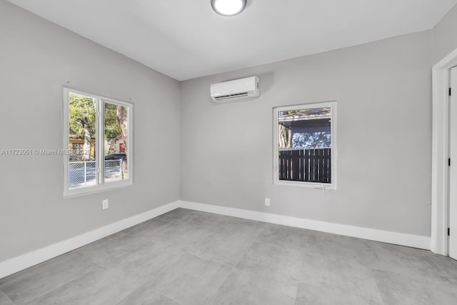 spare room featuring a wall unit AC