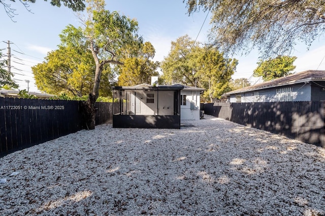 back of property featuring a sunroom