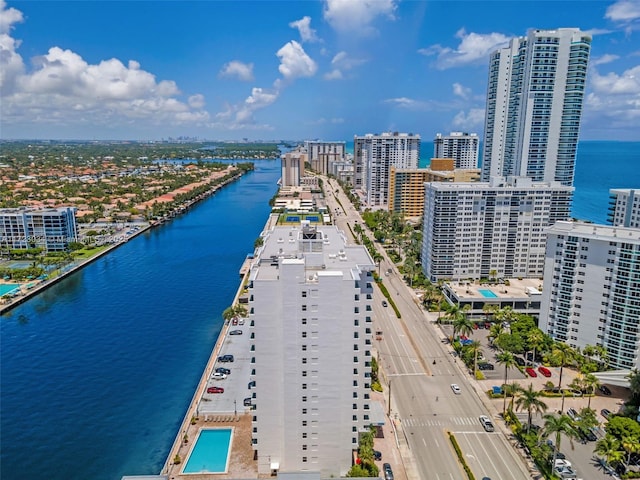 drone / aerial view with a water view and a city view