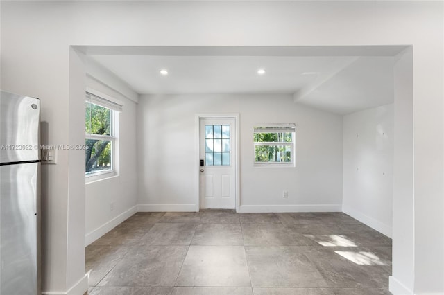 interior space featuring vaulted ceiling