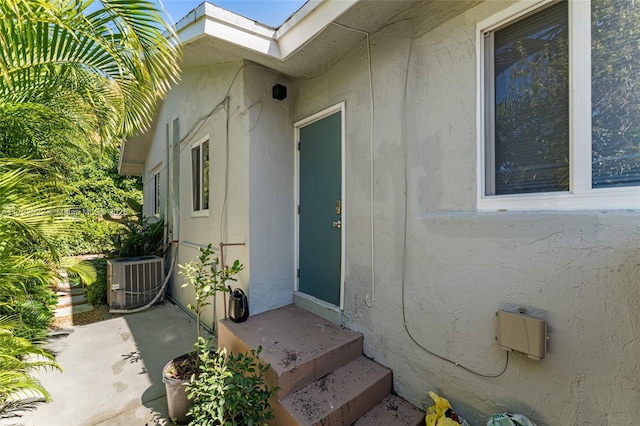 entrance to property with cooling unit