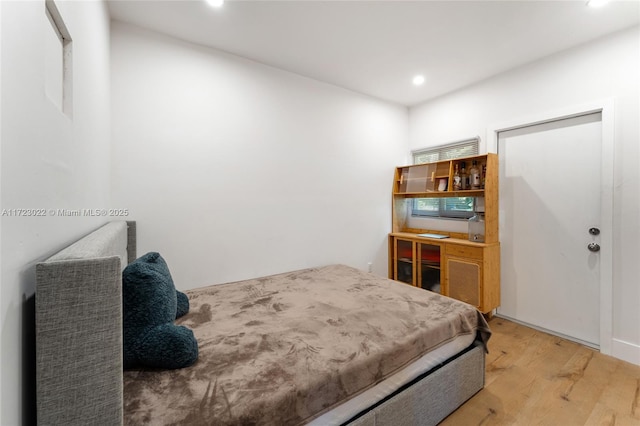 bedroom featuring hardwood / wood-style floors