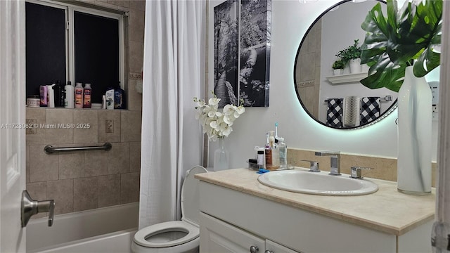 full bathroom with vanity, shower / bath combination with curtain, and toilet