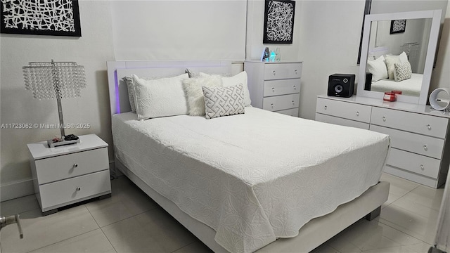 bedroom featuring light tile patterned floors