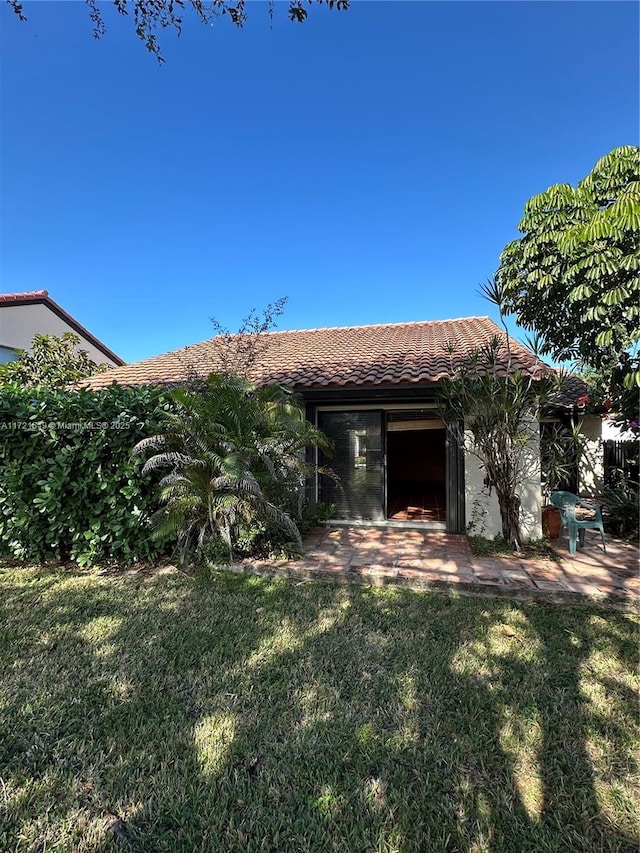 view of front of home with a front yard