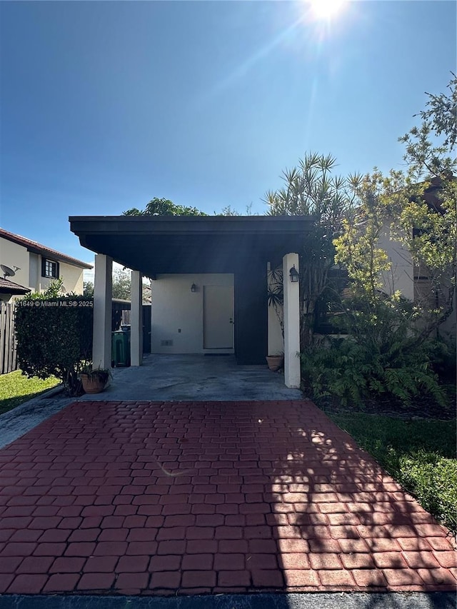 garage with a carport