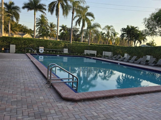 view of pool featuring a patio