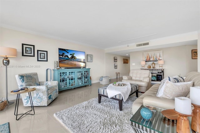 living room featuring light tile patterned floors and crown molding