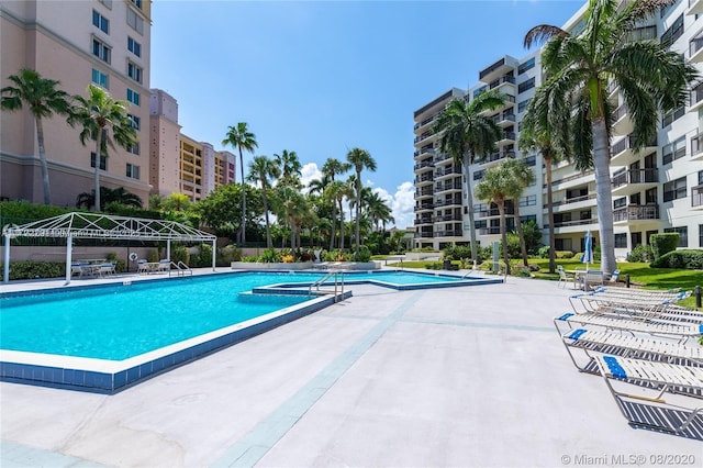 view of swimming pool featuring a gazebo and a patio