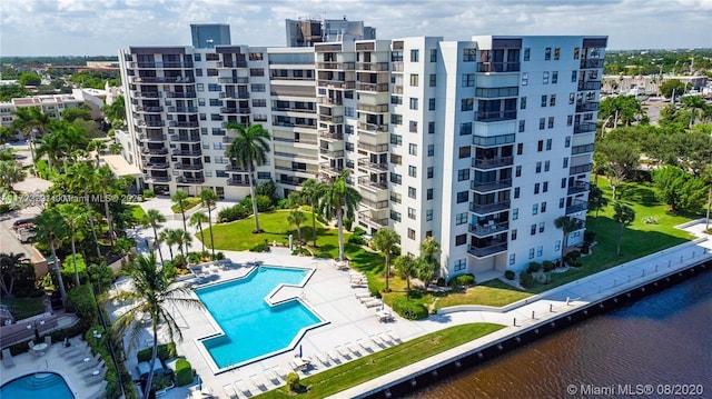 birds eye view of property with a water view