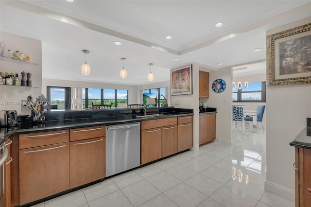 kitchen featuring dishwasher, sink, hanging light fixtures, a tray ceiling, and light tile patterned floors