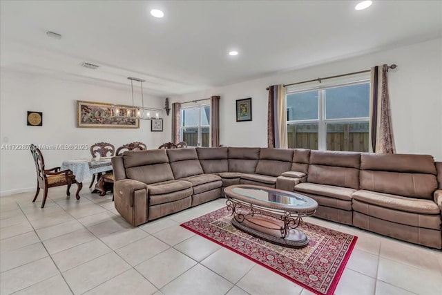 living room with light tile patterned floors