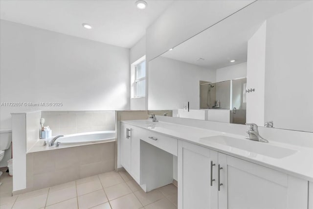 full bathroom featuring separate shower and tub, tile patterned flooring, vanity, and toilet