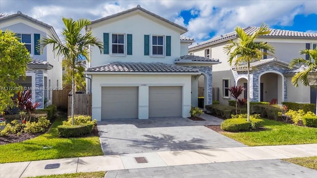 mediterranean / spanish-style house featuring a garage