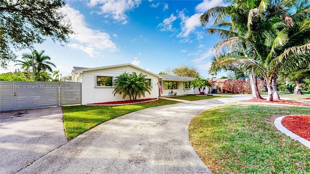 view of front of house with a front lawn