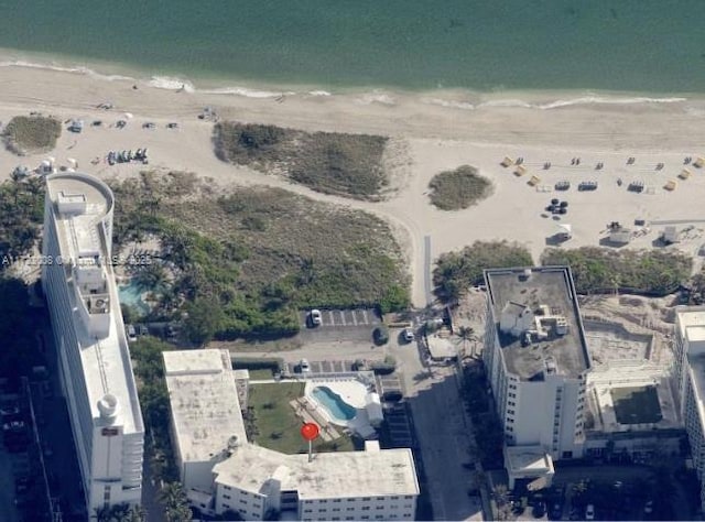 aerial view featuring a beach view and a water view