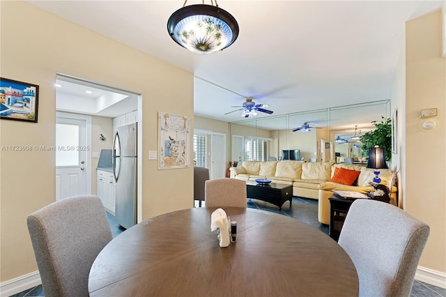 dining area featuring ceiling fan and recessed lighting