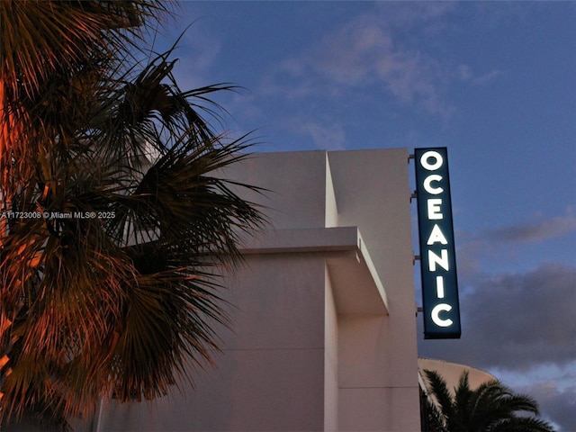 view of property exterior at dusk