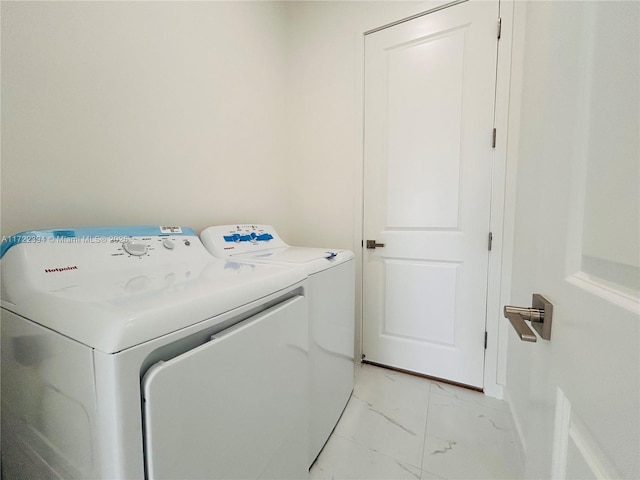 laundry area with washer and dryer