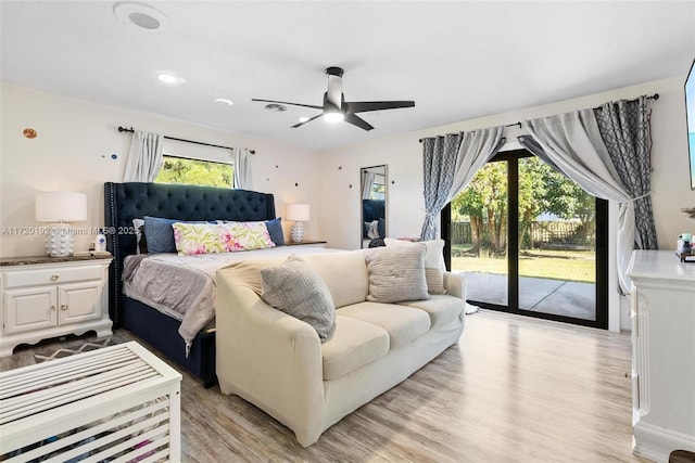 bedroom with ceiling fan, access to exterior, and light wood-type flooring