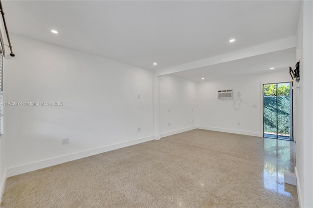 empty room featuring a wall unit AC