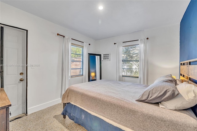 bedroom featuring multiple windows