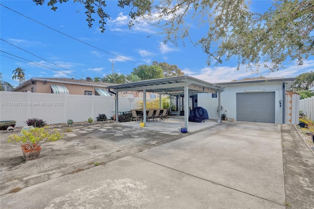 exterior space featuring a carport