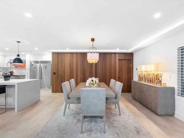 dining area featuring light wood-type flooring