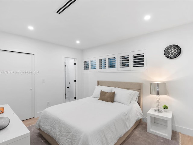 bedroom featuring light hardwood / wood-style floors