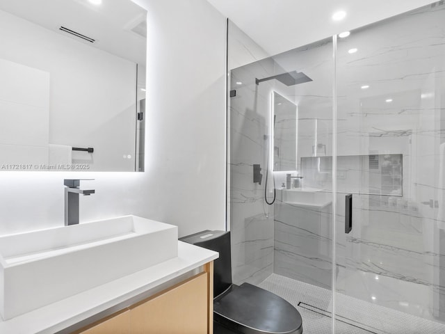 bathroom featuring vanity and walk in shower