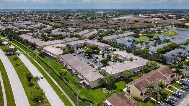 drone / aerial view featuring a water view