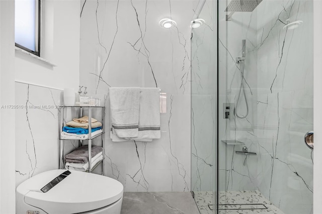 bathroom with a tile shower