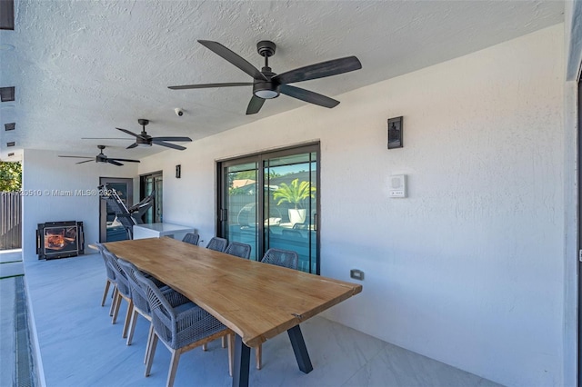 view of patio / terrace with a fireplace