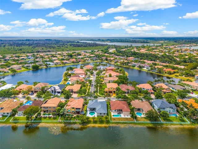 aerial view featuring a water view