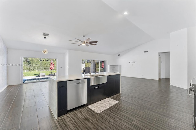 kitchen with pendant lighting, a center island with sink, sink, stainless steel dishwasher, and ceiling fan