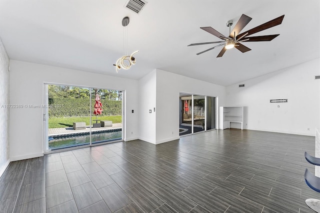 unfurnished living room featuring ceiling fan