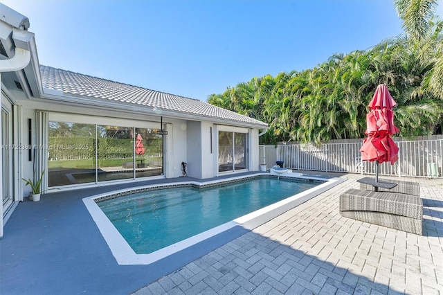 view of pool featuring a patio area