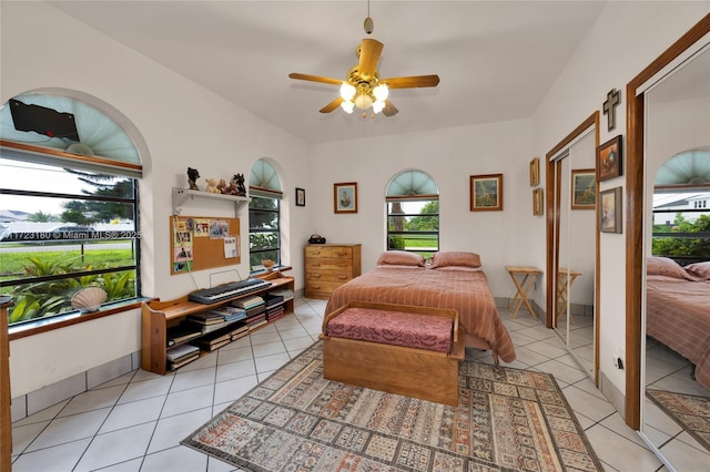 bedroom featuring ceiling fan and light tile patterned floors