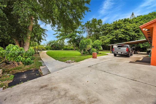 view of yard with a carport