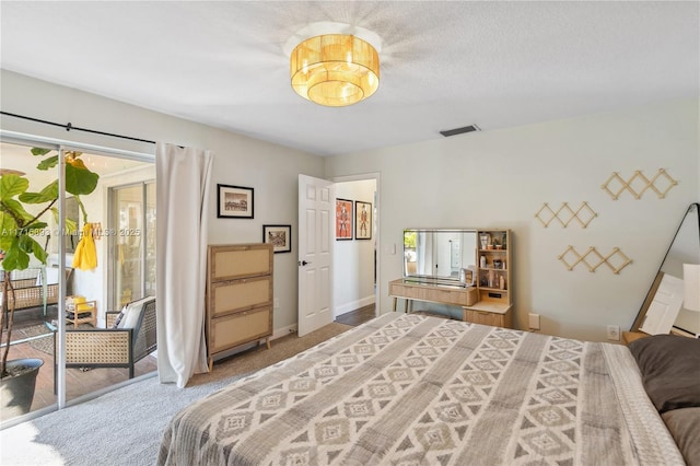 bedroom featuring carpet floors and access to outside