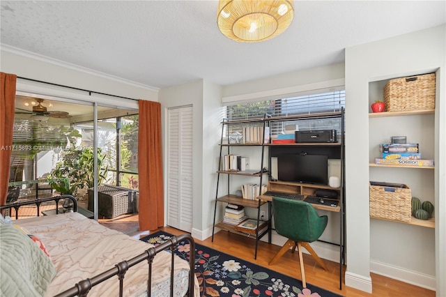 bedroom with hardwood / wood-style flooring