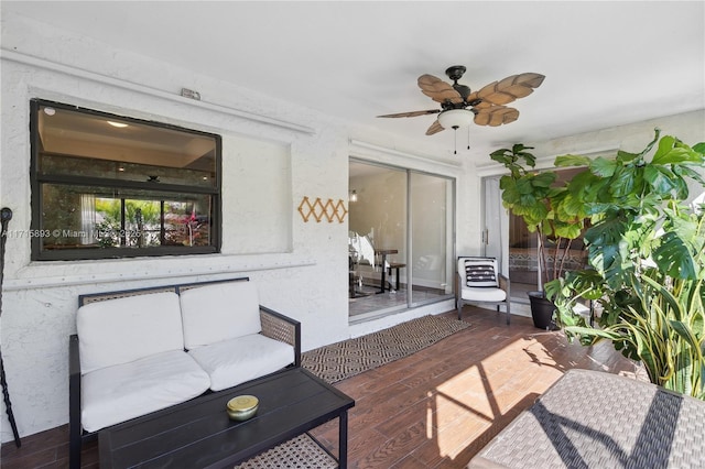 view of patio featuring ceiling fan