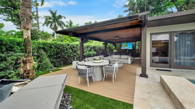 view of patio / terrace featuring a wooden deck and outdoor lounge area